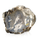 Marble relief of Shakyamuni Buddha with two attendants, carved in raw stone