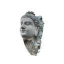 Stone statue of meditative Buddha head