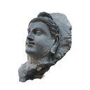 Stone statue of meditative Buddha head