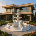 Large circular tiered marble fountain with carved horse statues