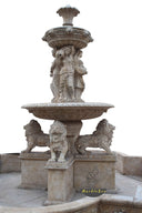 Large garden stone fountain with lion sculptures and lion head sprayer