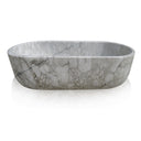 Freestanding natural stone tub