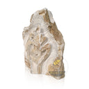 Abstract-style marble relief of Guanyin (or Buddha), carved in raw stone with antique grotto inspiration.