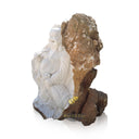 Emerging stone sculpture of Buddha