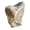 Abstract-style marble relief of Guanyin (or Buddha), carved in raw stone with antique grotto inspiration.