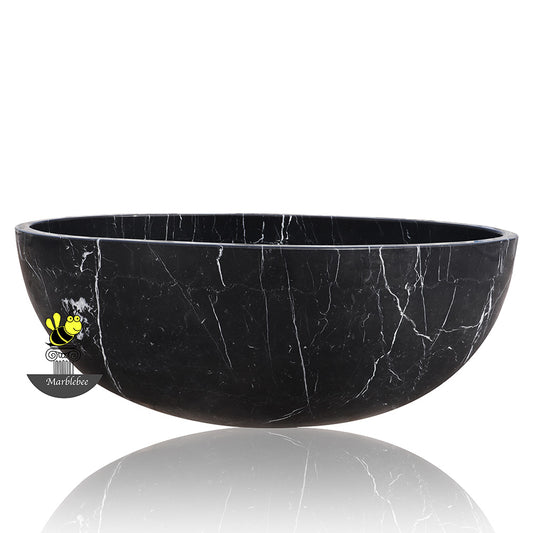 Oval black marble tub