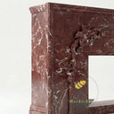 Marble fire surround | Ornate hand-carved details | Width: 63 Inch | Rosso Levanto