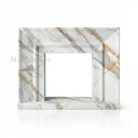 White marble fireplace in Calacatta Gold - Image 1