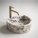 Marble washbasin in Calacatta Crema Viola - Image 1