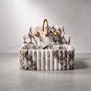 Natural stone basin in Calacatta Crema Viola - Image 1
