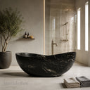 Natural stone bathtub in cosmic black granite - Image 1