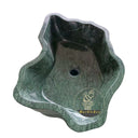 Baignoire en pierre de rivière