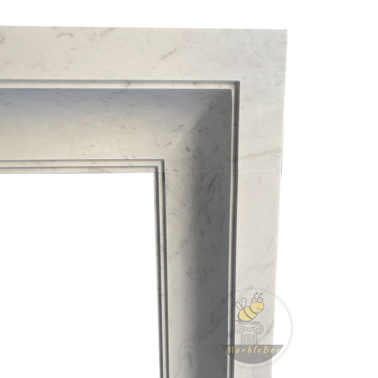 White stone fireplace Bolection