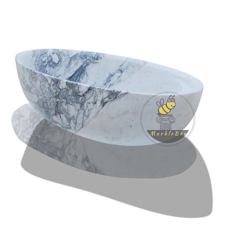 Artistic White Marble Soaking Tub with Blue Patterns