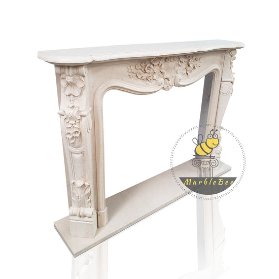 Marble fireplace mantel with conch carving