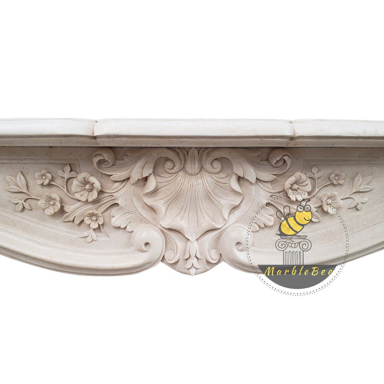 Marble fireplace mantel with conch carving