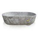 Freestanding natural stone tub