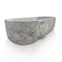 Freestanding natural stone tub