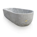 Freestanding natural stone tub