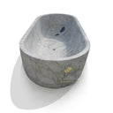 Freestanding natural stone tub