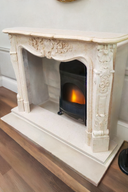 Marble fireplace mantel in light beige marble on sale