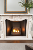 Marble fireplace mantel with conch floral carving
