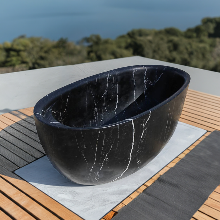 Stone bathtub made of natural black marble