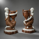 Garden stone planter with hand-carved statue