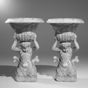 Garden stone urn with cherub carving