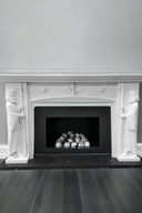White Marble Fireplace surround hand-carved with Faravahar symbol
