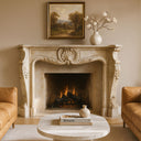Limestone fireplace surround in simple French elegant design