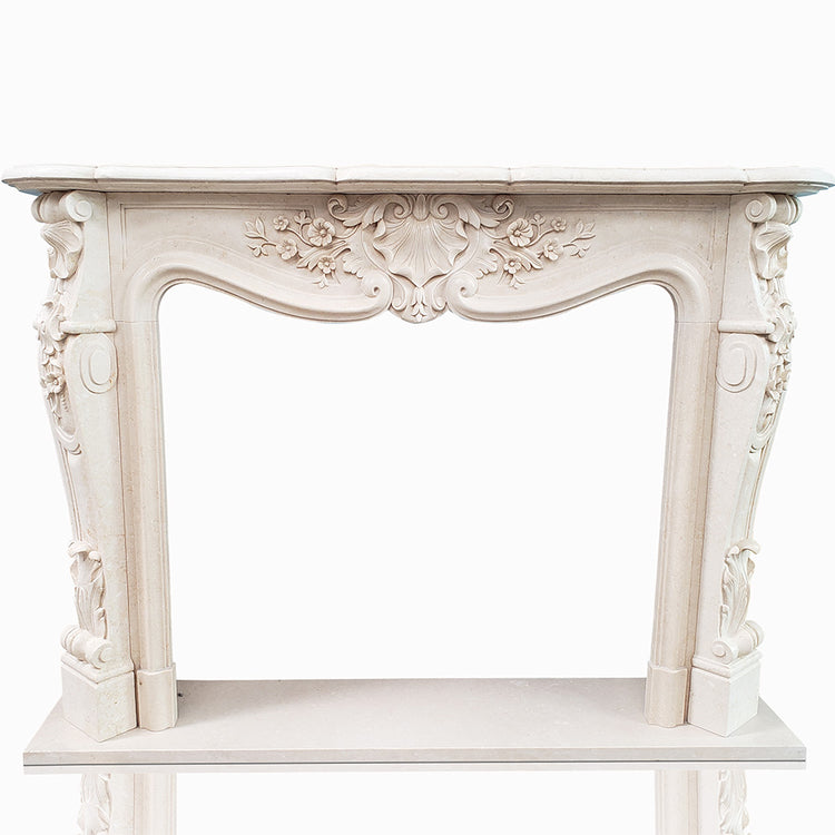 Marble fireplace mantel with conch floral carving