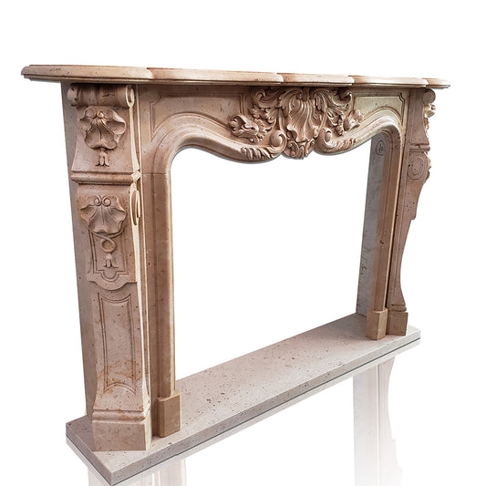 Marble fireplace surround in French style made of beige limestone