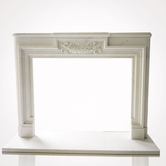 Customized marble fireplace surround made of white marble