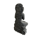 Stone statue of teaching Buddha seated