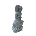 Stone statue of dark schist Buddha