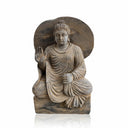 Stone statue of abhayamudra Buddha in Black Limestone