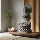 Stone statue of dark schist Buddha