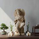 Stone sculpture of royal ease Avalokiteshvara