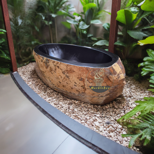 Stone bathtub River rock tub with rustic natural outside and polished inside