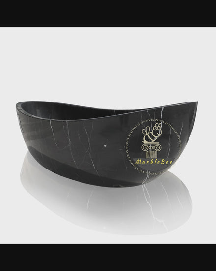 Large Matt black stone bathtub with white veining