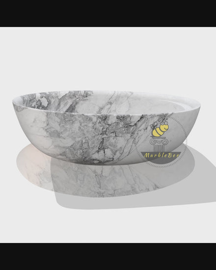 Artistic White Marble Soaking Tub with Blue Patterns