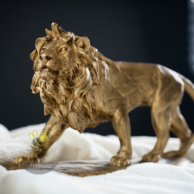 Bronze Lion statuette with golden color coating