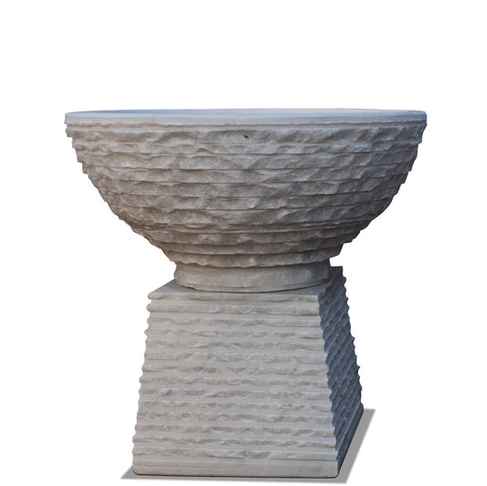 Chiseled garden stone surface urn