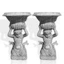 Garden stone urn with cherub carving